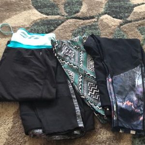 4 pairs of exercise pants , the aqua is capris